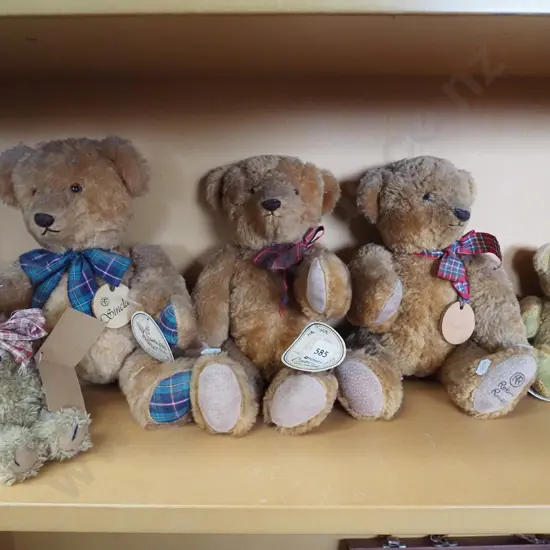 shelf of teddy bears - dusty