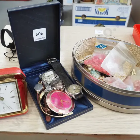 2x containers of costume jewellery, travel alarm clock