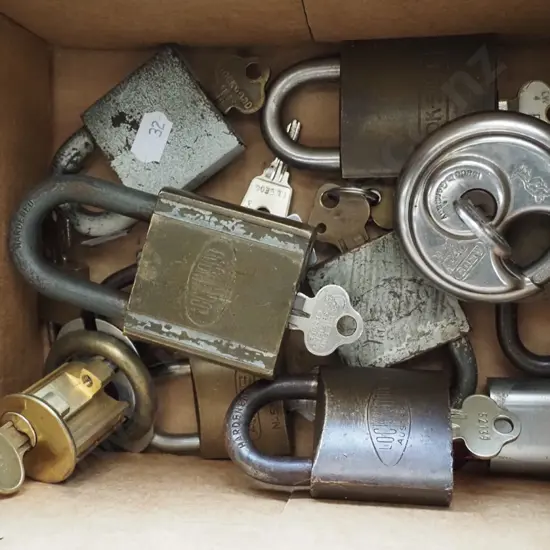 box of vintage padlocks