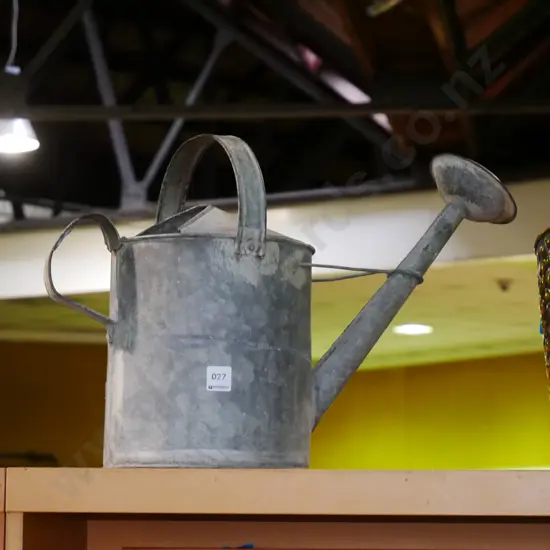 galvanised watering can