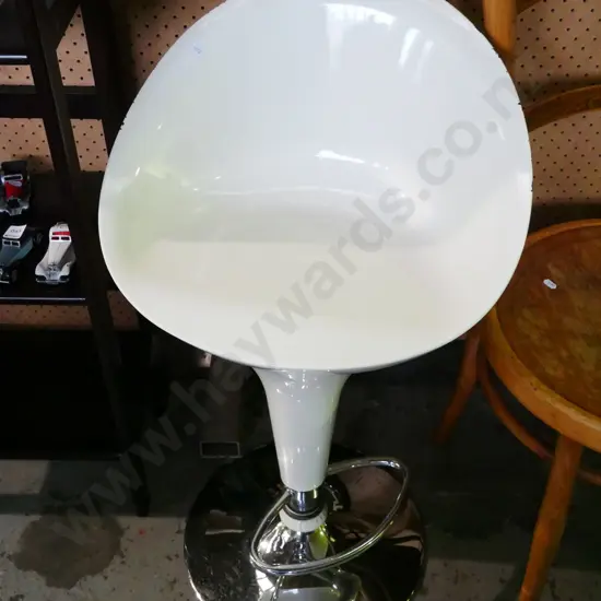 white plastic and chrome bar stool