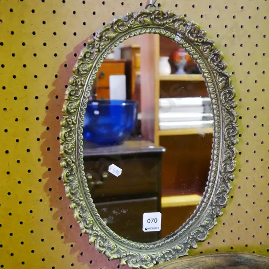 small cast alloy framed oval wall mirror - silvering