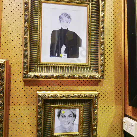 2x gilt framed prints - Princess Diana (1 has crack to glass) - yellow dots