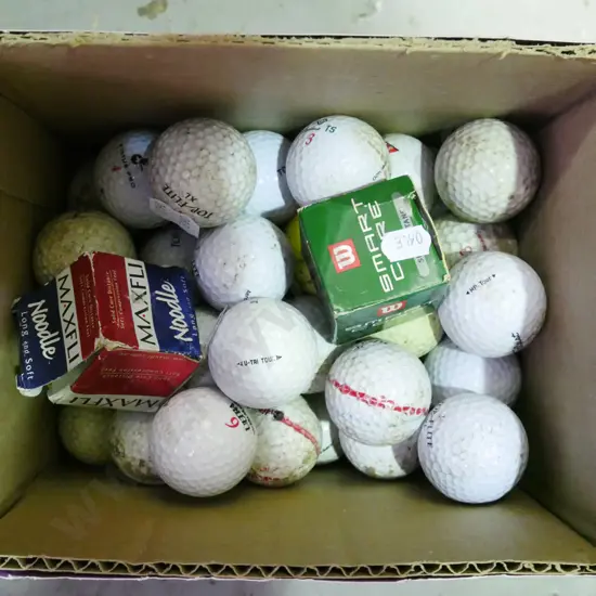 box of golf balls