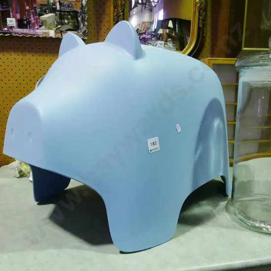 child's plastic pig seat