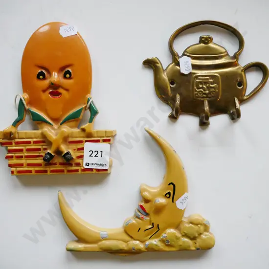 vintage cast alloy humpty dumpty, man in the moon foigures etc