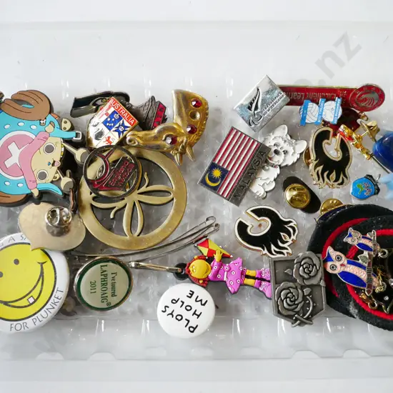 plastic tray of badges
