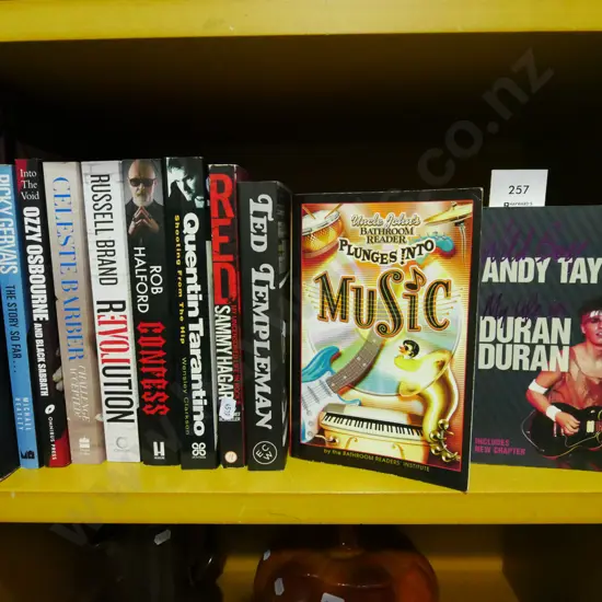 shelf of various music themed books