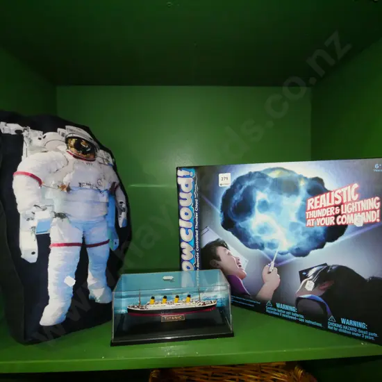 shelf; astronaut pilloe, Titanic model, boxed remote control thunder cloud