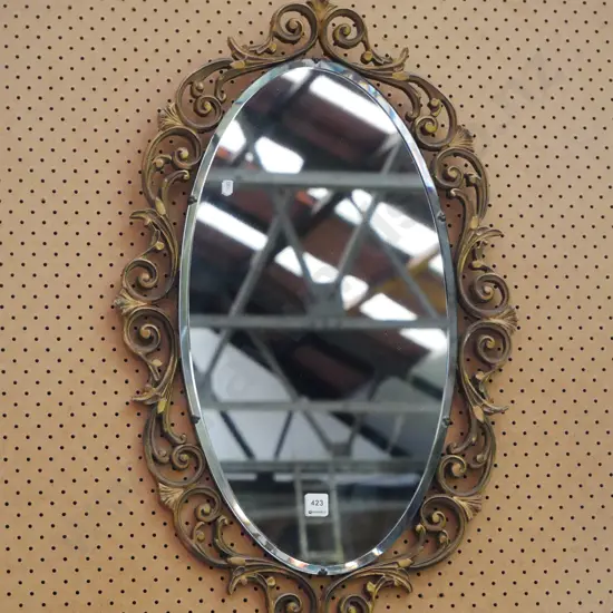 ornate gilt framed wall mirror