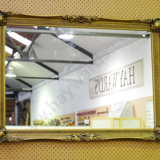 large gilt framed wall mirror