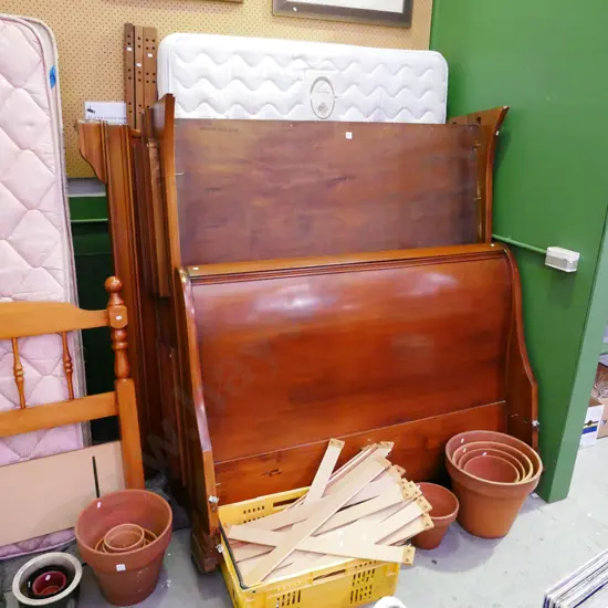 large wooden queen slat based sleigh bed