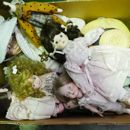 box of various dolls