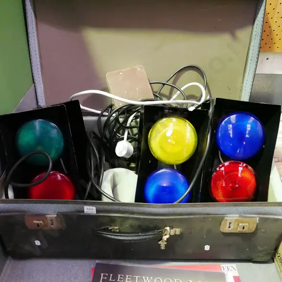 suitcase, various coloured stage lights