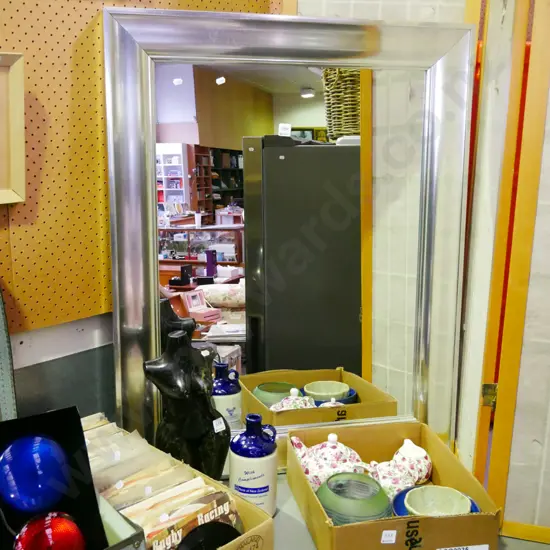 silver framed wall mirror