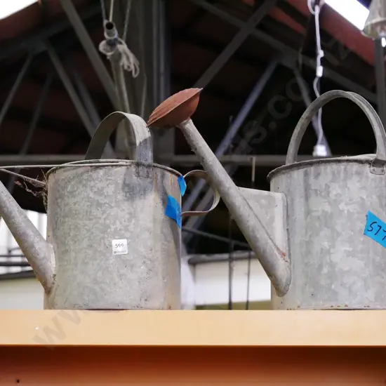 2x watering cans - some faults