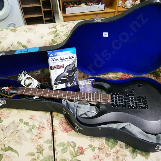 Cort electric guitar with hard case and PS4 instruction game, strings, tuner