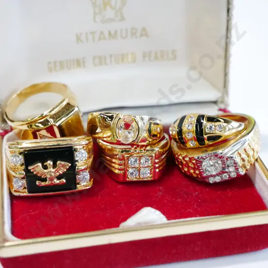 box of 6x golden dress rings
