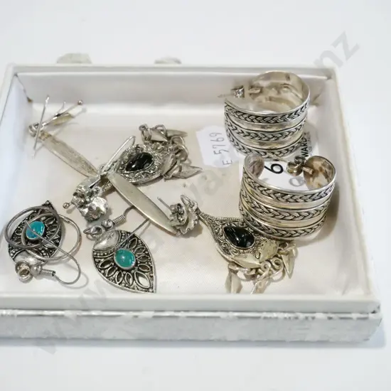 tray; silver earrings