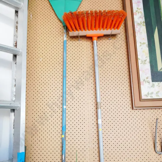 yard broom and grass rake - yellow dots