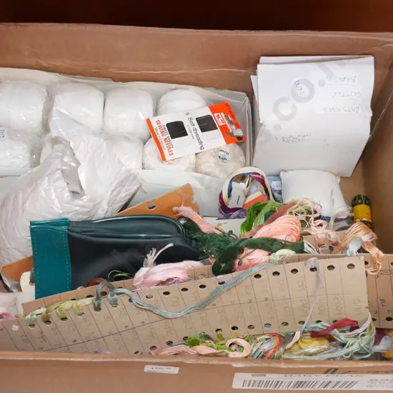 box; needlework threads, small wooden rings etc