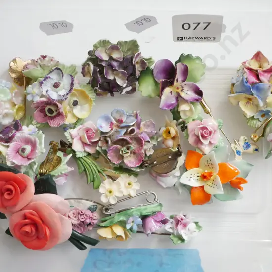 box; floral ceramic brooches - numerous chips, damage