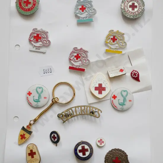 various red Cross badges