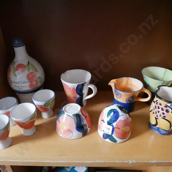 hand painted studio pottery cups, jugs etc