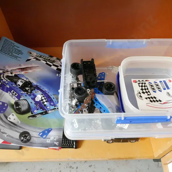 plastic tub of  Meccano racing car