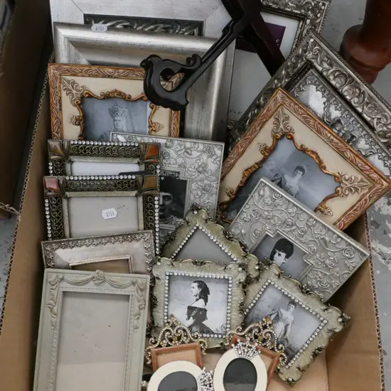 box;  ornate picture frames with digital prints of Queen Alexandra