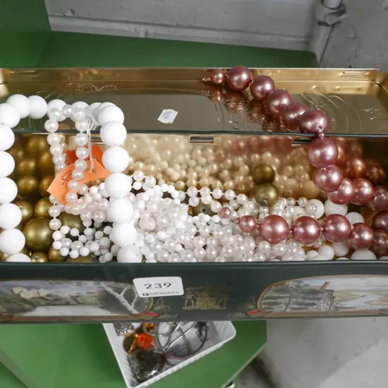 tin of costume jewellery