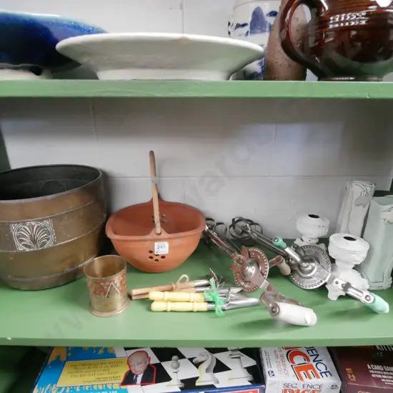 shelf; egg beaters, candlesticks etc