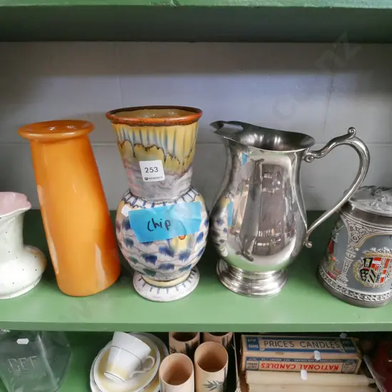 shelf; beer stein, orange glass vase etc
