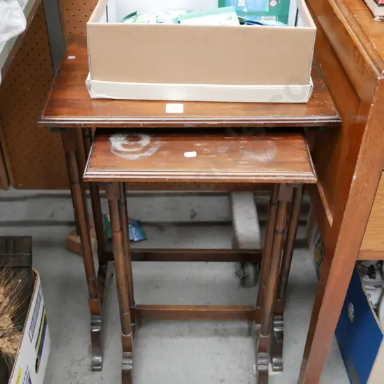 nest of 2 dark stained tables H-640