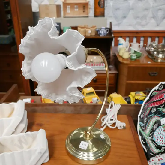 brass and frilled glass table lamp