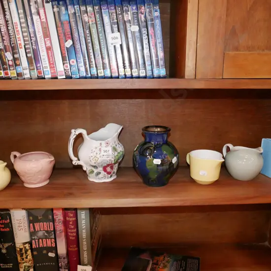 shelf of jugs, vase
