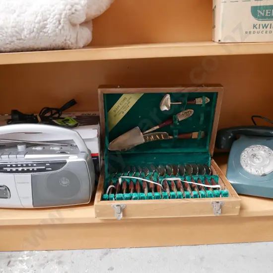 shelf; dial phone, radio cassette player, cutlery canteen