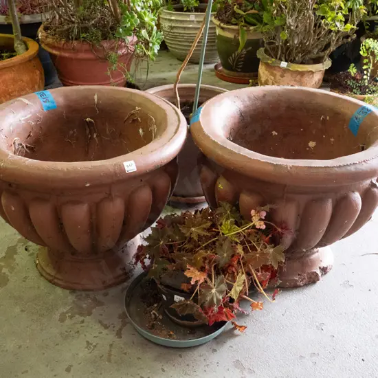 two large concrete garden urns H-430 D-560