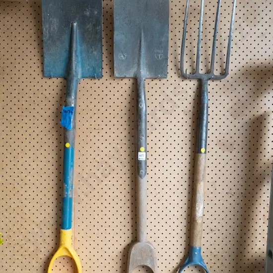 2 garden spades and a garden fork - yellow dots