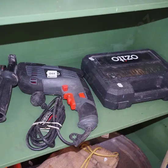 Ozito corded drill, box of drill bits and drivers