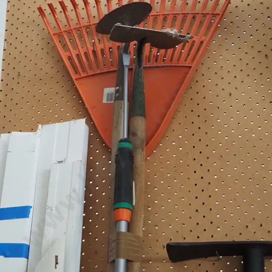 garden tools; hoes, rake, long handled lawn weeder