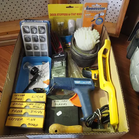box; glue gun, glue pot, stud finder etc