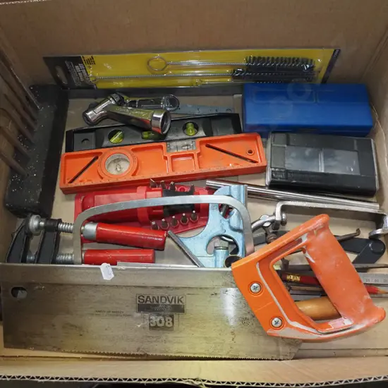 box; hand saws, F clamps, builder's square etc