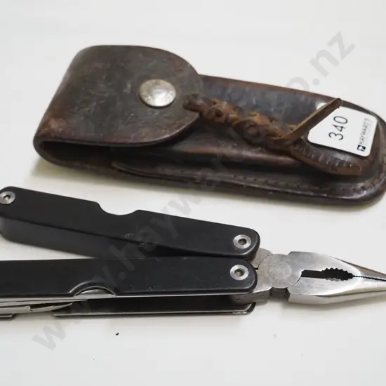 multi tool in leather sheaf