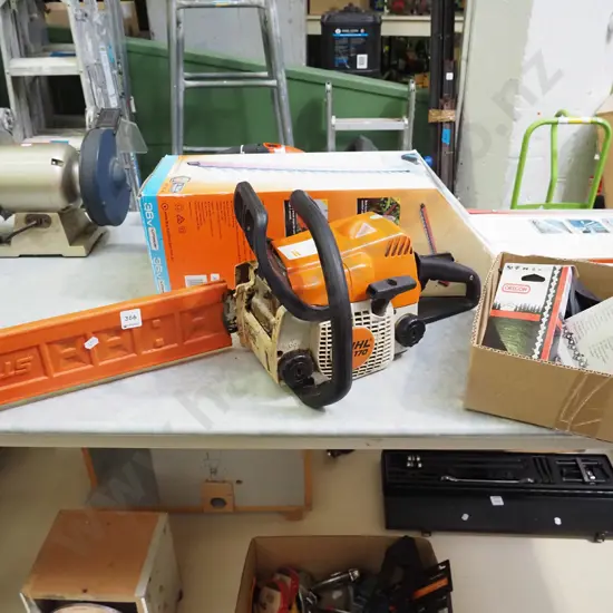 Stihl MS 170 chainsaw and box of accessories