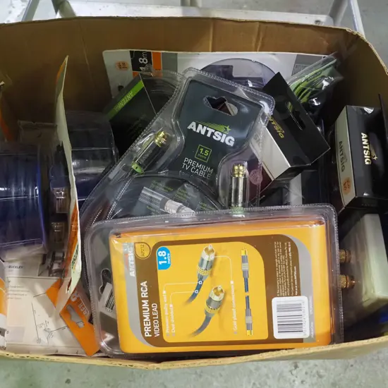 box of audio leads and cables