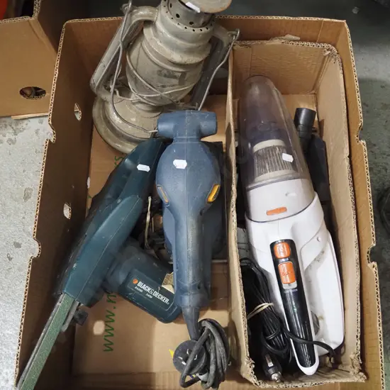 box; Black & Decker file sander, orbital sander, small 12V vacuum, hurricane lantern