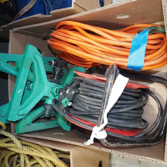 box; garden sprinklers, extension cords