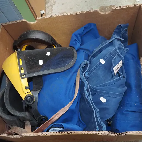 overalls, knee pads, face shield