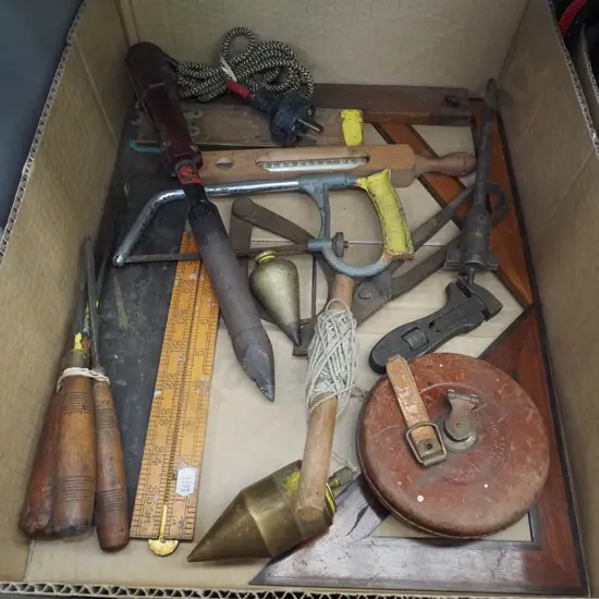 box; vintage plumb bob, draughting square, soldering iron etc